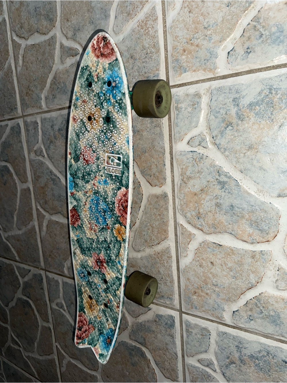 Globe Floral Cruiser Skateboard in Teal, Pink and Yellow